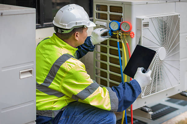 Professional Hvac technician working in Amery, WI